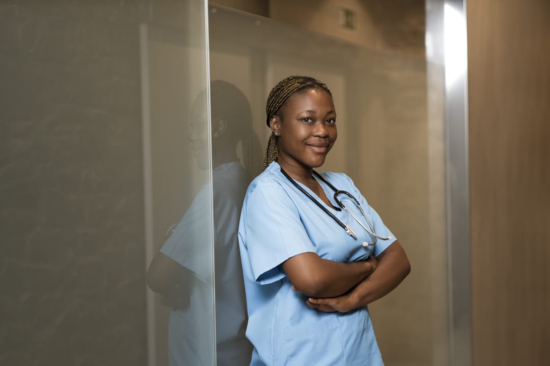 Travel Nurses Can Avoid Scams - nurse in nose mask